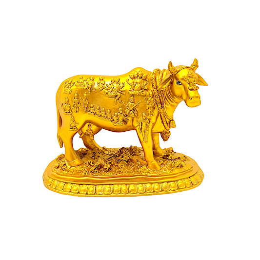 Cow gold with dieties carved in relief on 8 in,